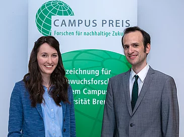 Iris Dcker (left) and Dr. Andreas Gutmann from the University of Bremen were honoured with this years CAMPUS AWARD: Research for a Sustainable Future. Prospective teacher Iris Dcker from Loxstedt near Bremerhaven received the prize for her Master's thesis on digital teaching materials that provide a better understanding of sustainability and modern agriculture. Legal scholar Dr Andreas Gutmann was recognised for his dissertation on the rights of "nature or pacha mama" in the Ecuadorian constitution.